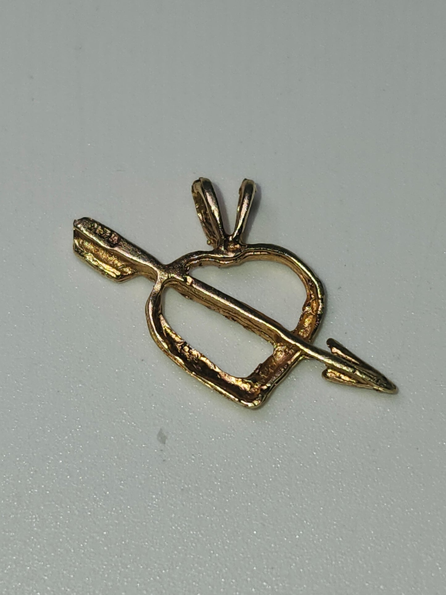 14K Gold Arrow Through Heart Diamond Cut Pendant