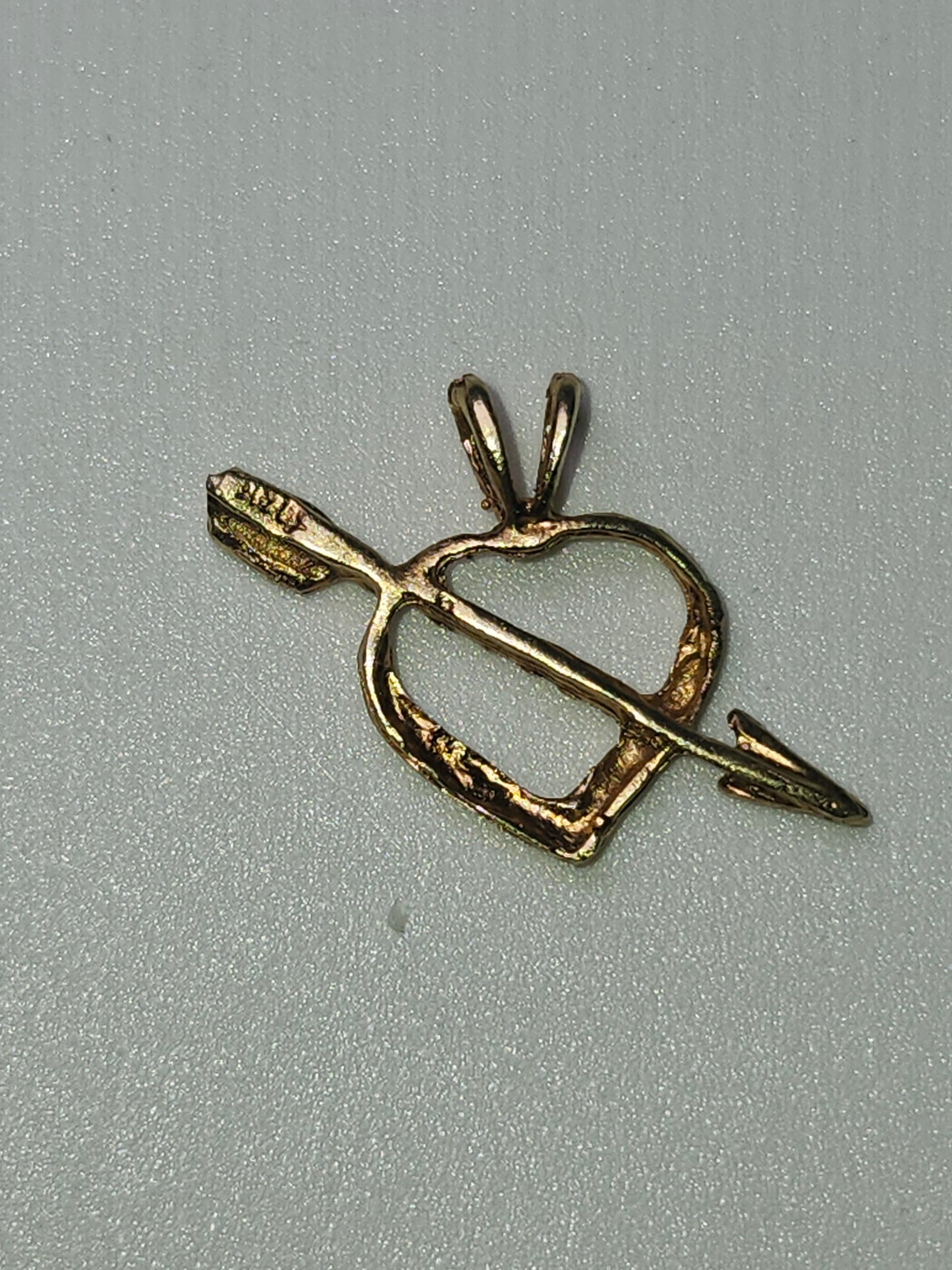 14K Gold Arrow Through Heart Diamond Cut Pendant