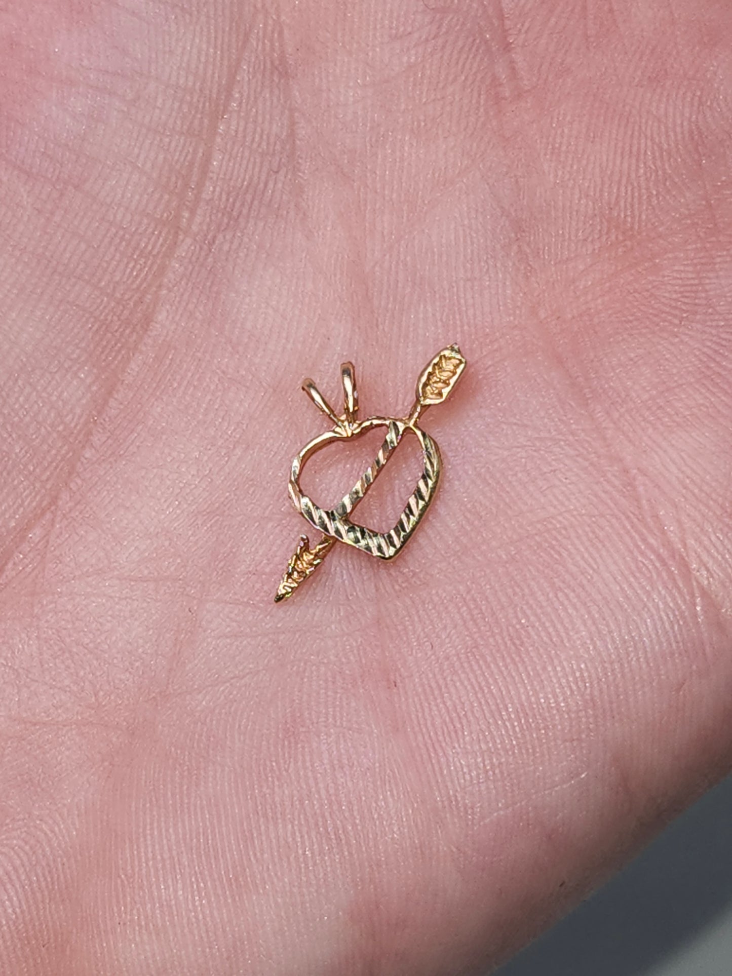14K Gold Arrow Through Heart Diamond Cut Pendant