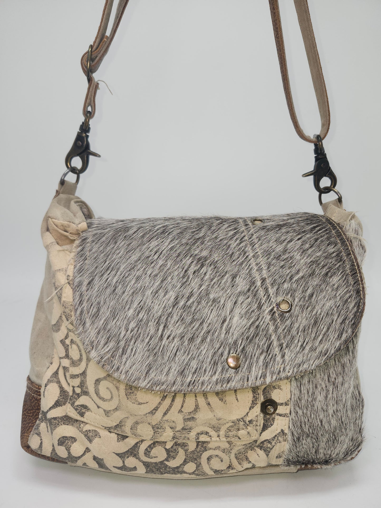 Myra Bag Y2K Cowhide Messenger Bag on Swirl Canvas
