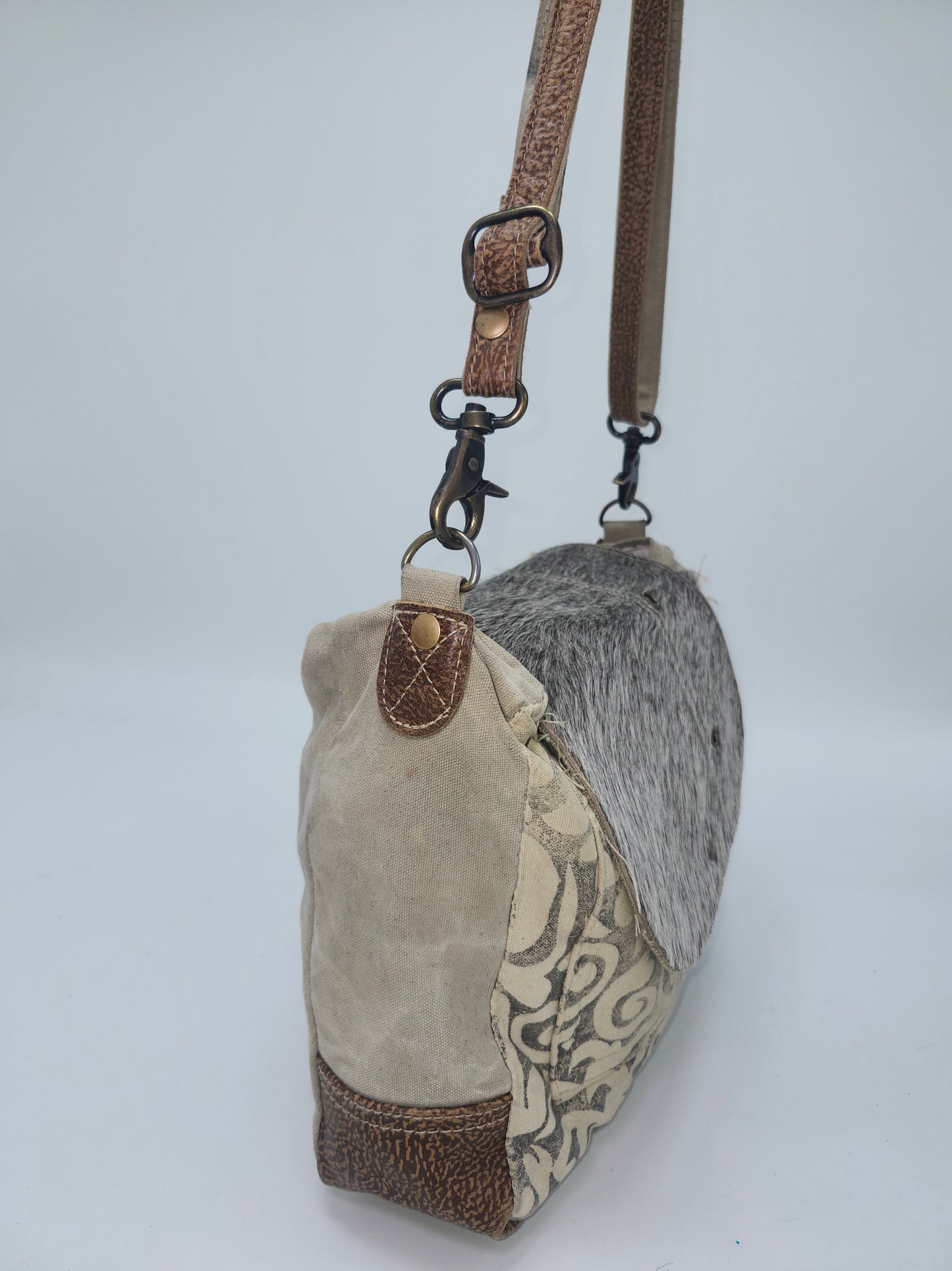 Myra Bag Y2K Cowhide Messenger Bag on Swirl Canvas