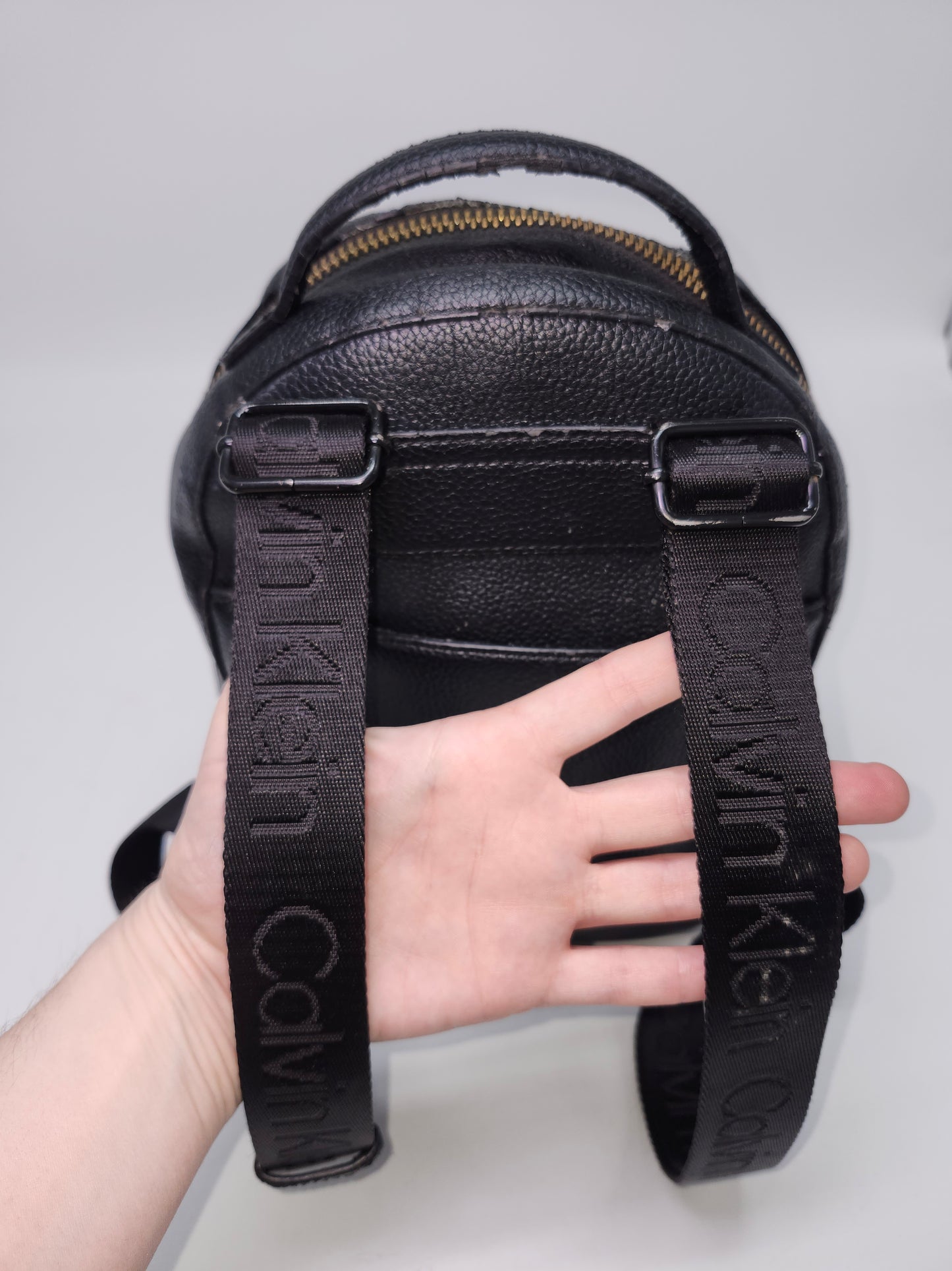 Calvin Klein Perforated Black Leather Backpack with Branded Straps
