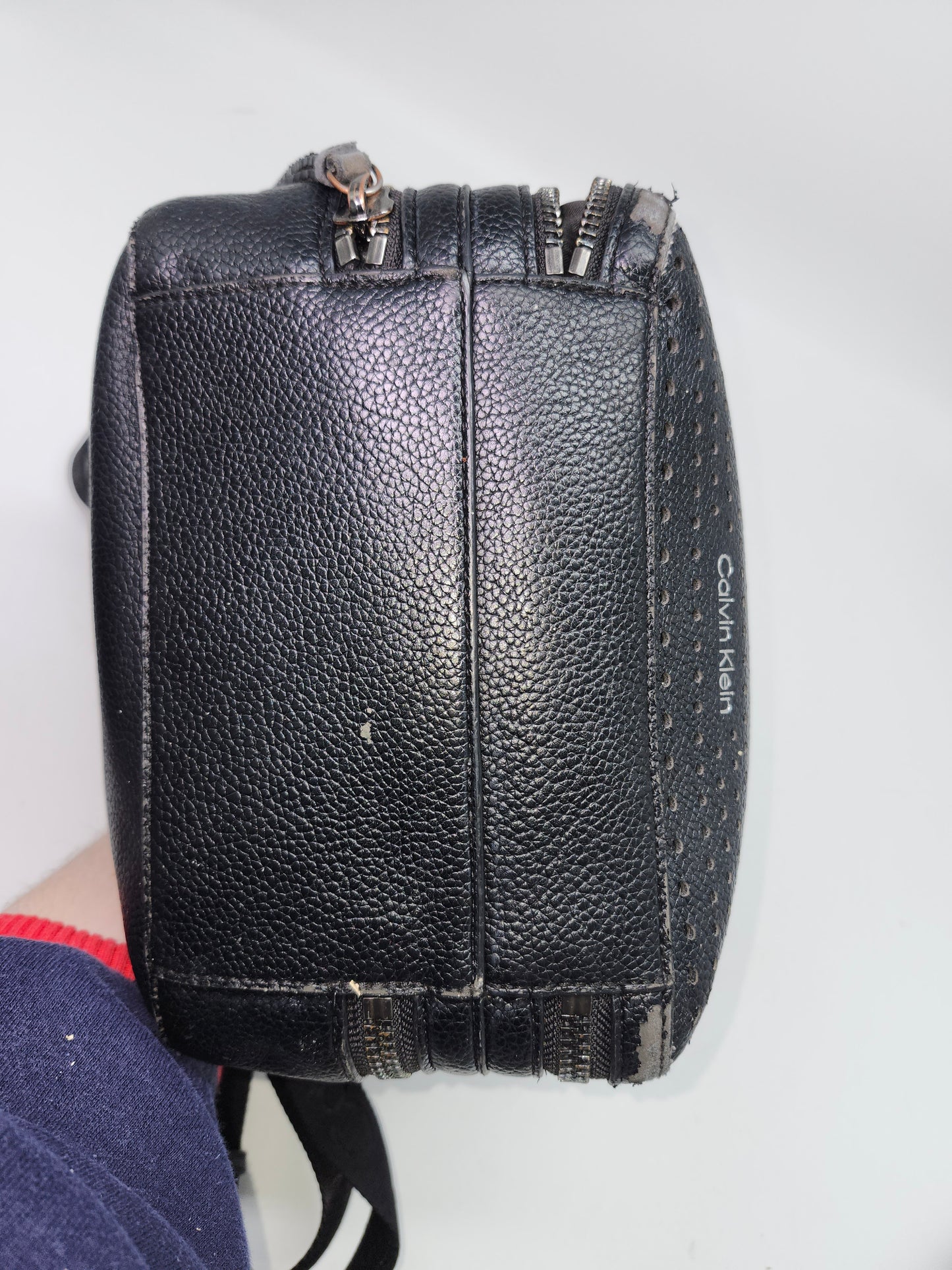 Calvin Klein Perforated Black Leather Backpack with Branded Straps