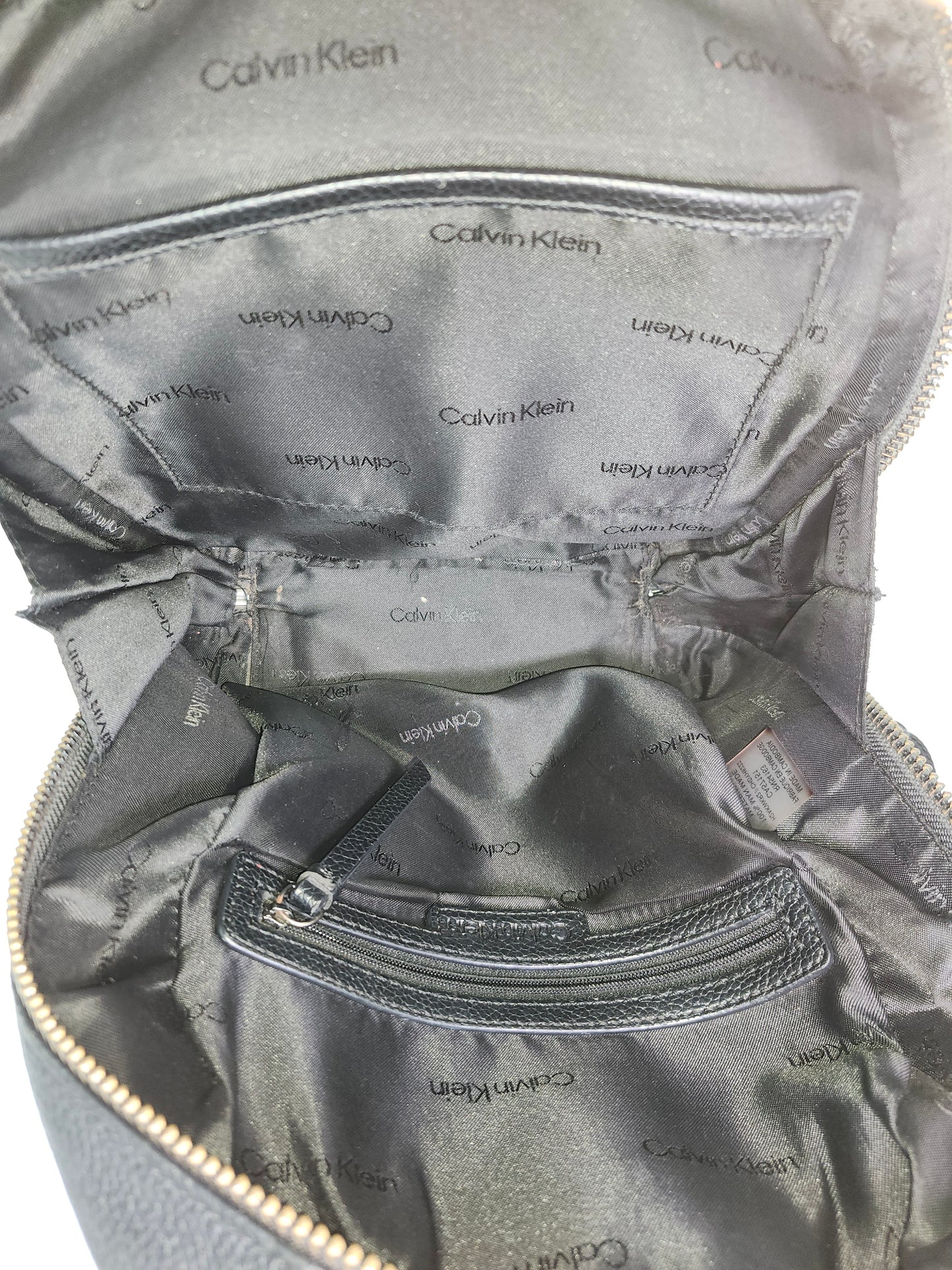 Calvin Klein Perforated Black Leather Backpack with Branded Straps