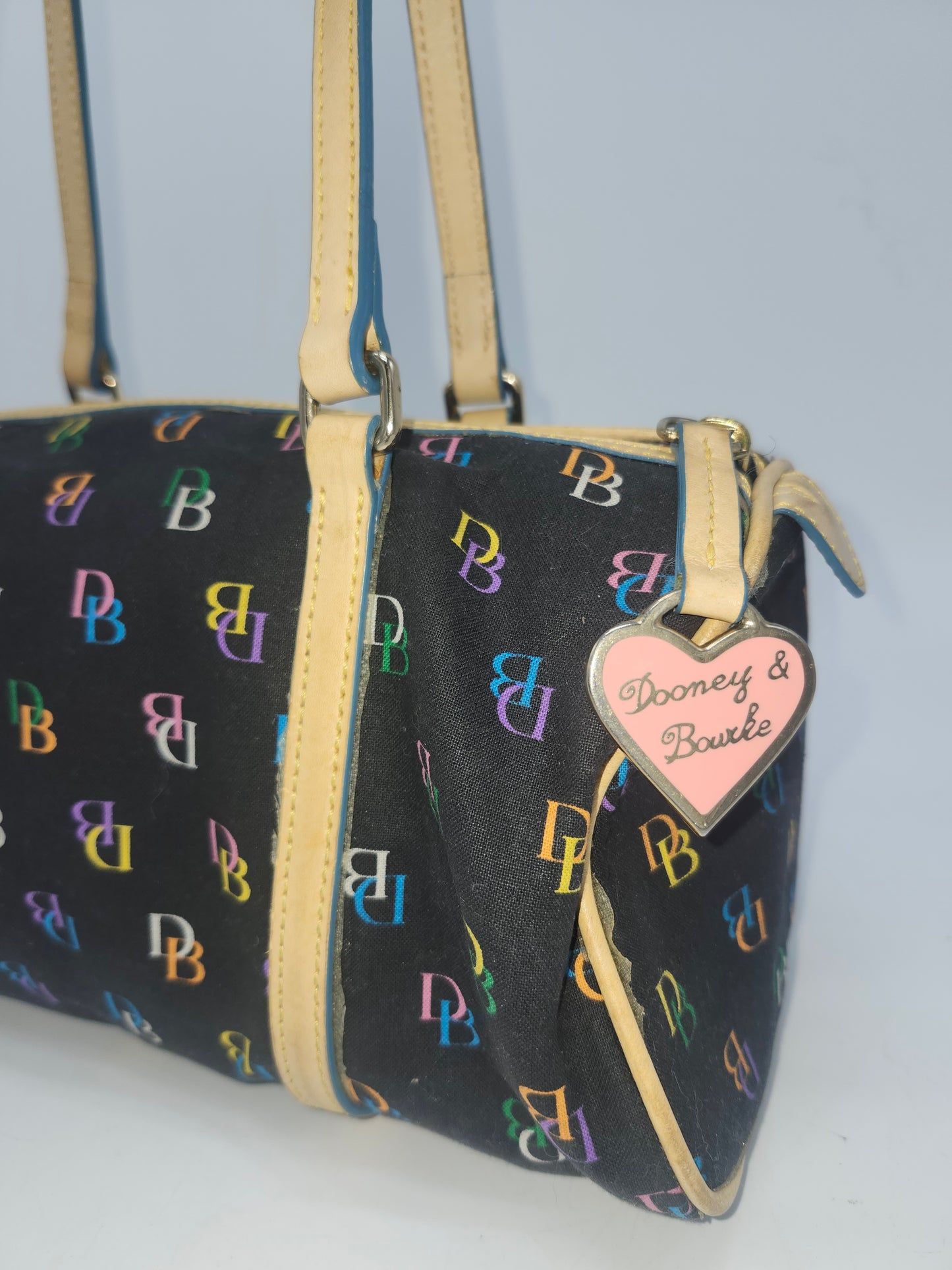 *Dooney & Bourke* Y2K Rainbow Monogram Barrel Bag
